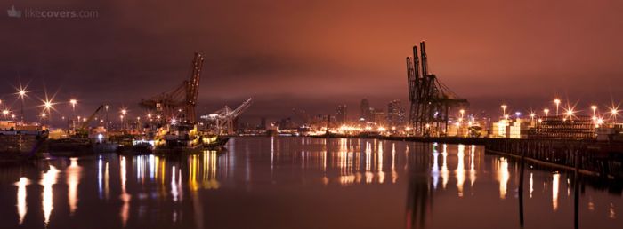 City harbor with cranes river night