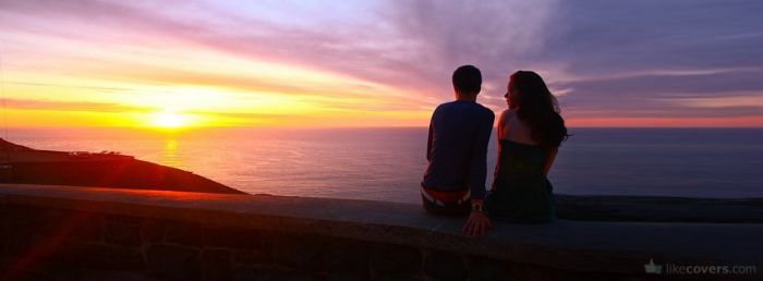 Couple sitting watching the sunset above the clouds Facebook Covers