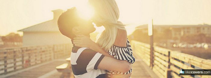 Cute couple kissing in the sun Facebook Covers