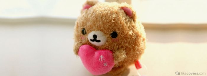 Cute little bear holding heart Facebook Covers