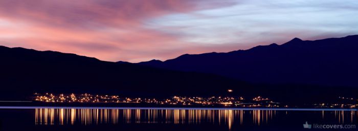 Lights reflecting off the lake sunset mountains Facebook Covers