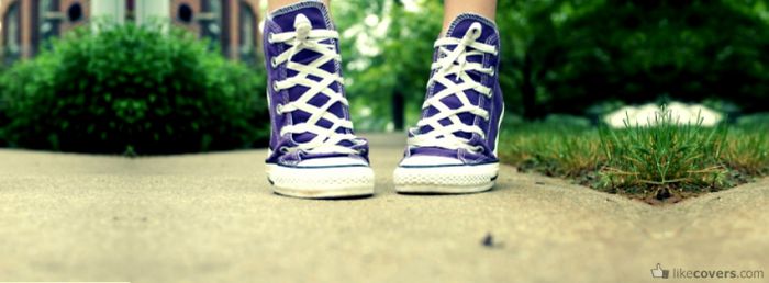 Purple Converse on tippy toes