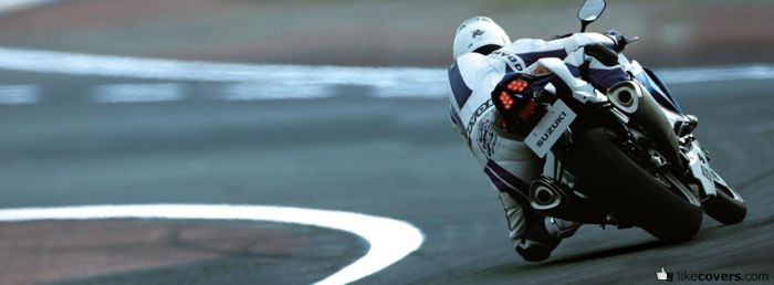 Speedbiker taking a turn on a track course Facebook Covers
