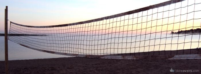 Volleyball net on the beach sunset